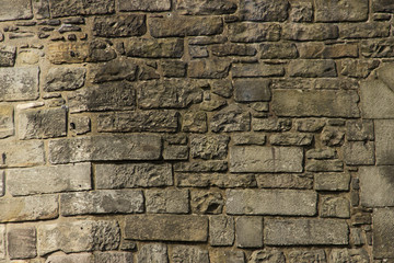 Hintergrund von Steinwand gemischter Steingröße von Burgwand