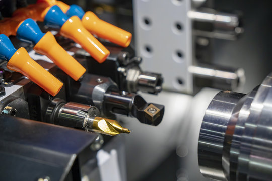 Close-up of the cutting tools magazine of the multi-function CNC lathe machine.Center drill tools at the CNC turning machine.