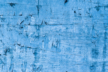 Obraz premium Blue plywood wall scratch texture. for text or background.