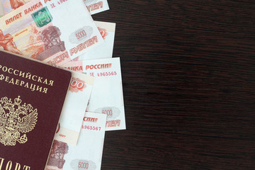 Russian passport and currency business and travel concept