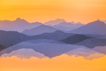 Fototapeta na wymiar Colorful, abstract double exposure of mountains in sunrise. Minimalist scenery with color gradients. Tatra mountains in Slovakia, Europe.