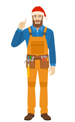 Worker in Santa hat pointing up