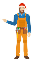 Worker in Santa hat showing somewhere