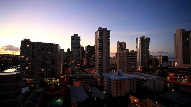 Buildings of Waikiki Beach at Honolulu on Oahu Island, Hawaii, USA at sunset, circa October 2013