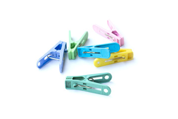 Pile of colorful clothespins isolated on white background