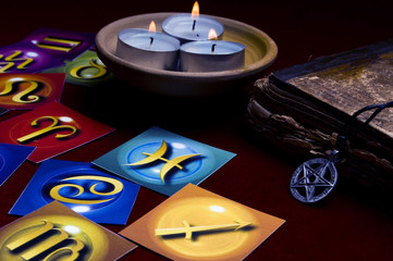 zodiac signs with three candles and pentagram like esoteric amd astrology concept 
