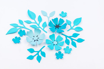 Obraz na płótnie Canvas Flower and leaf of blue color made of paper