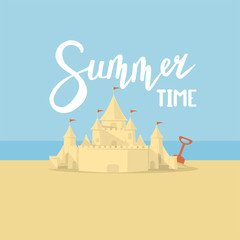 sand castle on the background of the sea and the beach