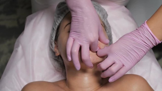 the client gets a facial massage