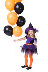 Young girl in halloween costume with balloons on white background