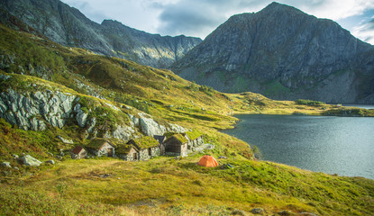 A beautiful, historic stone buildings in the mountains of Folgefonna National Park in Norway. Old...