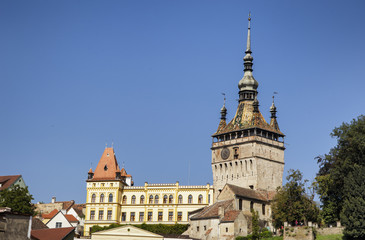 Obraz premium SIGHISOARA, MURES, ROMANIA - AUGUST 08, 2018: View of the Clock Tower at Sighisoara Citadel , Transylvania.