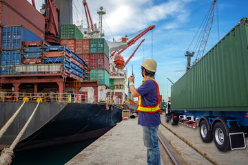 the loading and discharging operation container ship vessel in port takes control by stevedore and...