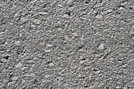 Used asphalt texture from above close up