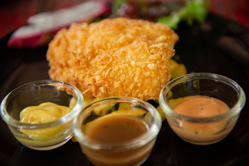 top view of mix steak with and fresh green herb salad and dragon fruit on vintage wooden table
