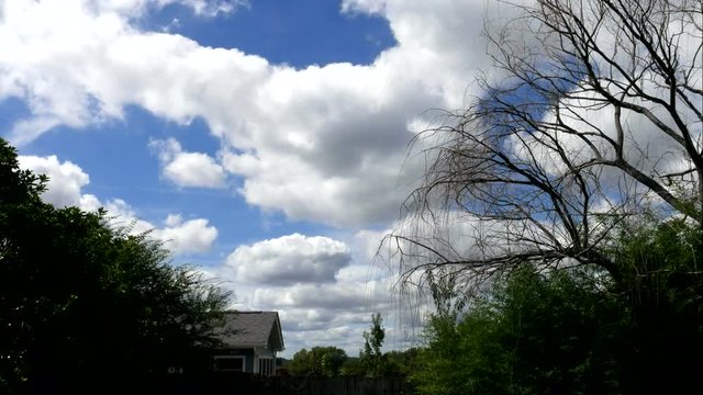 Backyard timelapse of clouds rolling by.