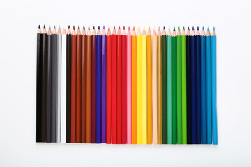 Colored pencils isolated on white background