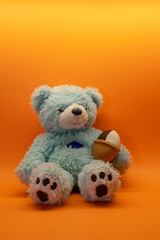 Cute teddy bear toy on background with copy space