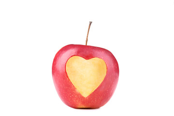 Fototapeta na wymiar Red apple with cutout heart shape on white background