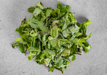 Heap of peppermint leaves and grass