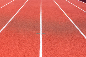 Fototapeta premium Close up of Running track pattern background in stadium.