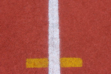 Close up of Running track pattern background in stadium.