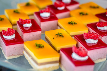 Assorted desserts puffs tarts puddings cakes creme brulee