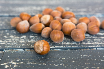 Hazelnuts in shells on the table