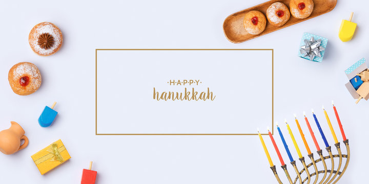 Jewish holiday Hanukkah banner design with menorah