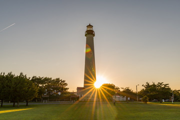 Cape May New Jersey Lighthouse Sunset Flare - obrazy, fototapety, plakaty