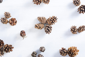 pine cones on white wood table, purity Christmas decoration