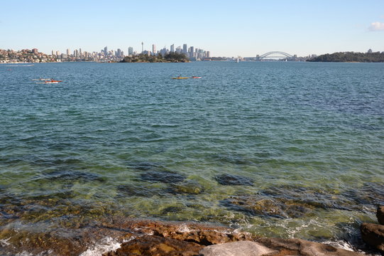 View of Sydney skyline and Sydney Harbour from Milk beach.