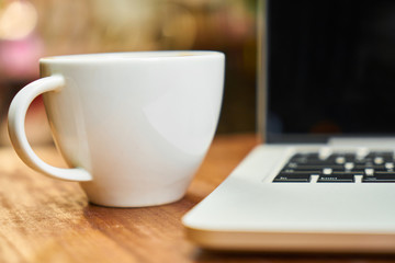 Laptop with Cup
