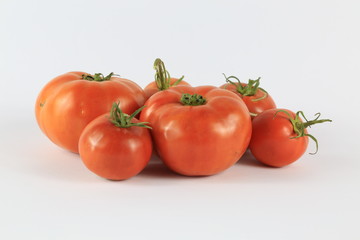 Fresh Tomatoes On Isolated White Background