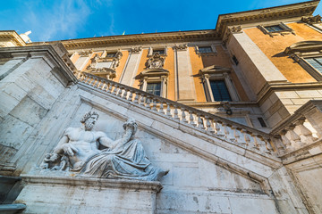 Tiber statue by Campidoglio facade in Rome