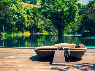 luxury swimming pool at tropical hotel resort