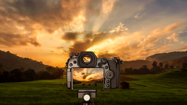 Digital camera with sunrise over Paddy field 1