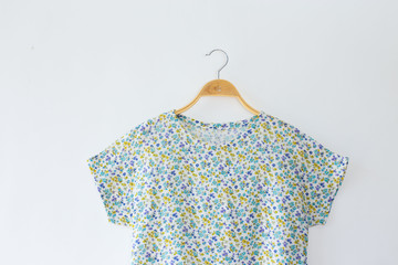 Minimal style.summer blouse with a floral pattern. isolated on white background