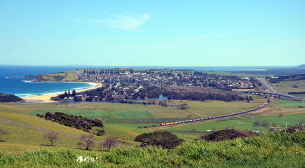 Panoramic view of Gerrigong from Mount Pleasant Lookout. Mt Pleasant Lookout at Kiama Heights provides views across beach and town. Taking in the seaside town of Gerringong and Werri Beach.