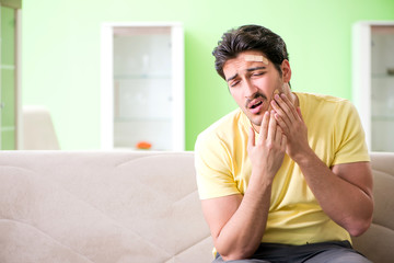 Young man at home after injury