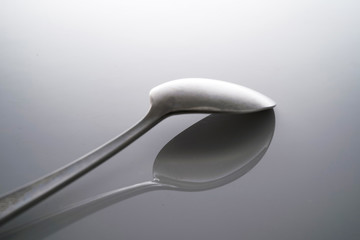 Fork & Spoon Kitchen Utensils fine art abstract on white isolated background