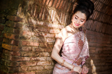 Beautiful Thai girl in Thai traditional costume