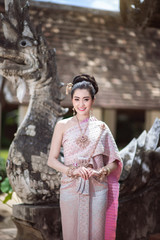 Beautiful Thai girl in Thai traditional costume.