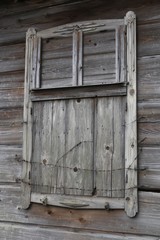barred old wooden window