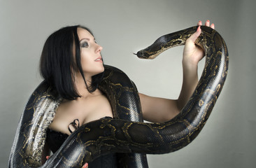 beautiful sensual woman and python