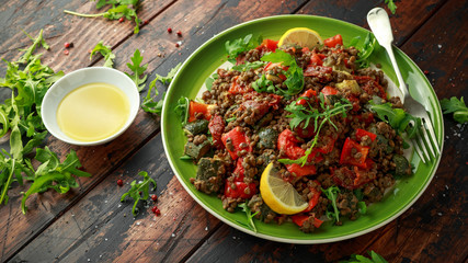 Lentil salad with roasted red pepper, zucchini and dry tomatoes, lemon. healthy food, vegetarian and vegan style