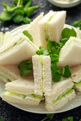 Cucumber sandwiches with soft cheese, sea salt and water cress for tea party