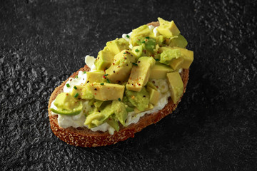 Vegetarian Healthy bread toasts with cottage cheese and avocado