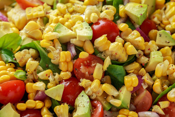 Sweet Corn salad with tomatoes, avocado, red onion, herbs and lime
