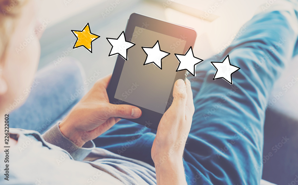 Poster one star rating with man using a tablet in a chair